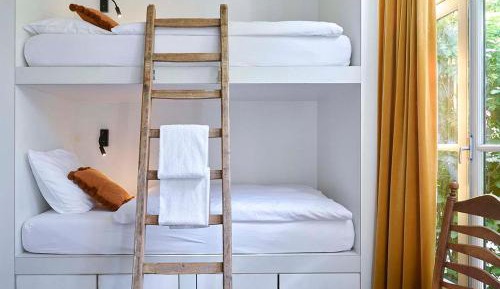 Bed in 8-Bed Female Dormitory Room