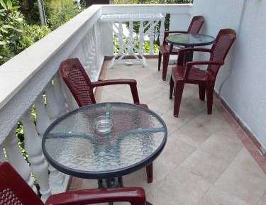 One-Bedroom Apartment with Balcony and Partial Sea View