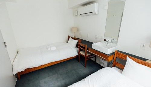 Twin Room with Shared Shower and Toilet