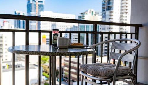 One-Bedroom Apartment with Balcony and City View