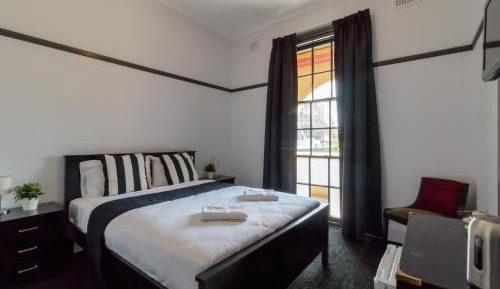 Queen Room with Shared Bathroom