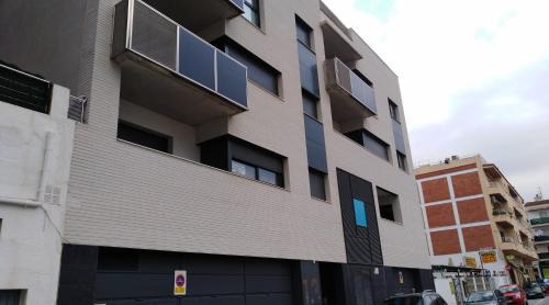 Three-Bedroom Apartment with Balcony