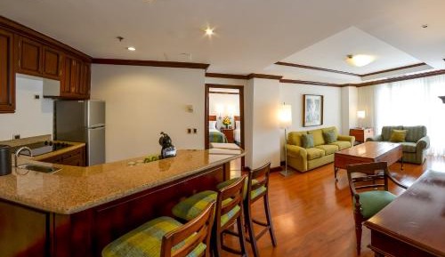 Master Suite with Two Queen Beds and Sofa Bed