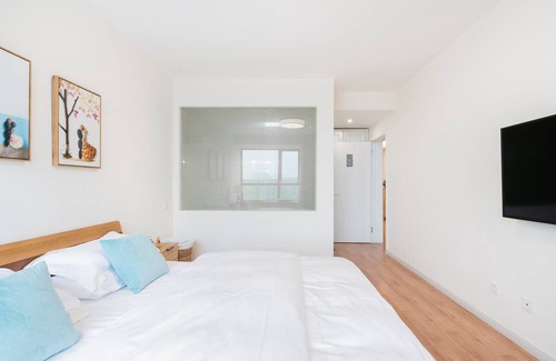 Qingdao City Center Apartment | 清暖&桃源 奥帆中心五四广场/高层海景三居/优雅精装