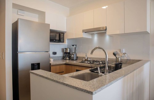 San Isidro Apartment | Aquilaria 1001A by Wynwood House