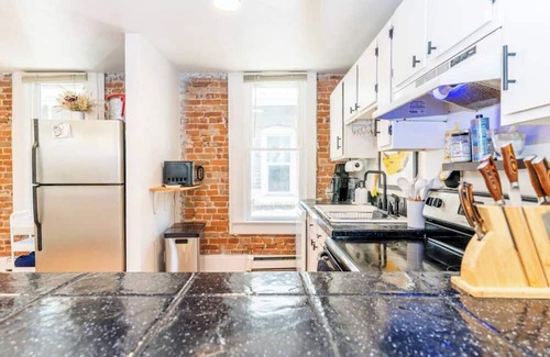 City Park Apartment | Stylish Uptown Retreat - 2BR with Sunroom/Office and Movie Room