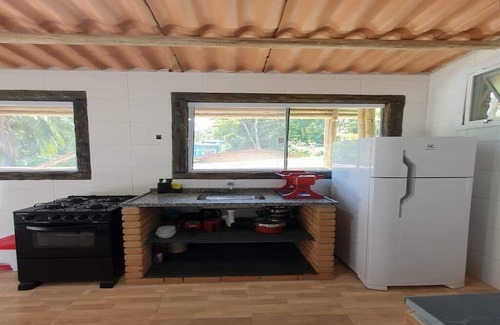 Praia da Fortaleza Condo | Next to lush nature, suite with TV, kitchen, wifi, barbecue, and garage