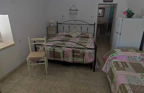 Posto Vecchio Apartment | Apartment 'Trullo' with Private Terrace, Private Garden and Air Conditioning