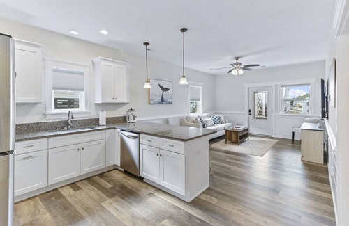 Colington Harbour House | Gorgeous soundside home w/ hot tub, 2 living areas, & soundfront community pool!