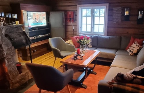 Flesberg Cabin | Moderne, lun og koselig tømmerhytte på Blefjell