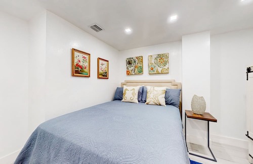 Everglades City House | Colorful riverfront retreat with large patio, pier, & great views - dog-friendly