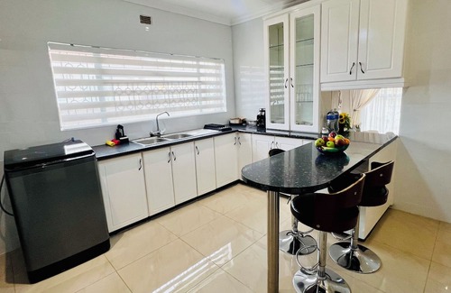 Manzini House | Homely, Spacious, Comfy beds, pillows & crisp linen, coffee, private & secure.