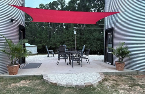 Navasota Cabin | One of a kind grain bin silo cabin getaway near wedding venues and A&M!