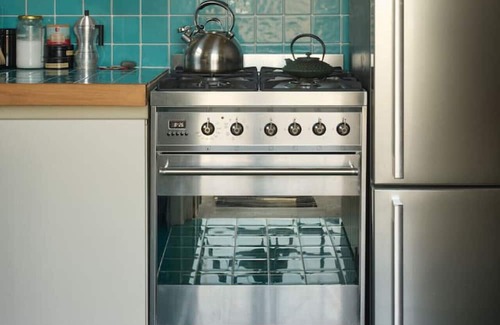 Kew Apartment | Cleopatra's Villa - Inspired Art Deco Apartment