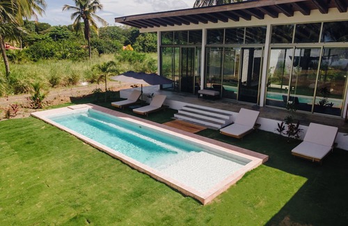 Playa Coyote House | Luxury Coastal Retreat – Modern Architecture, Family Comfort & Ocean Views