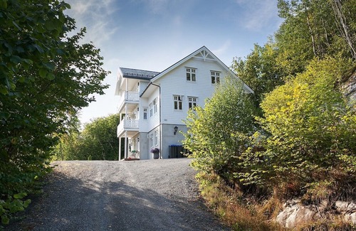 Glomset Apartment | Peaceful countryside flat near Ålesund. Fjord & Mountain views, patio & garden