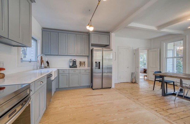 Elegant Reimagined Victorian: Modern Comforts & Timeless Charm in Woodstock