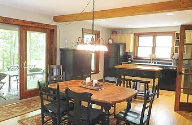 Spacious river home w/pellet stove, outdoor dining area, fire pit, & BBQ grill