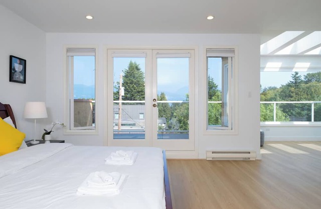 Elegant Spanish Villa near Jericho Beach with Mountain & Ocean Views