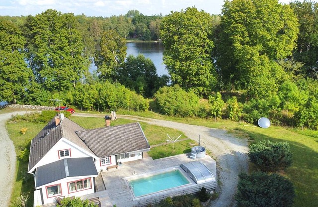 Villa Waldsee - Holiday home by the lake in Småland with pool, hot tub & sauna