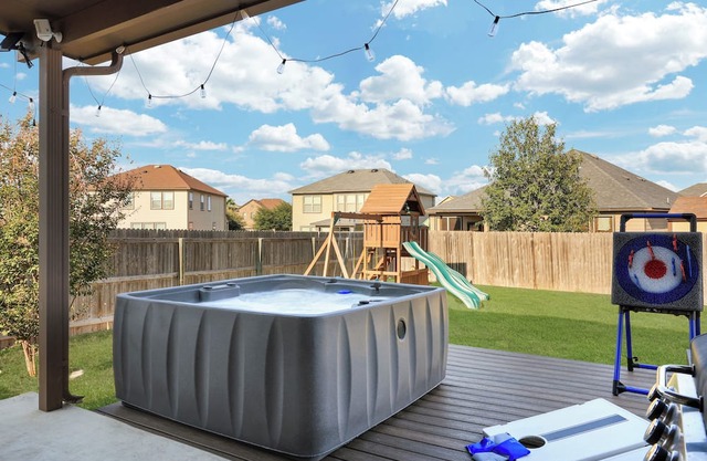 Hot Tub Retreat | Games BBQ Air Hockey Swing Set