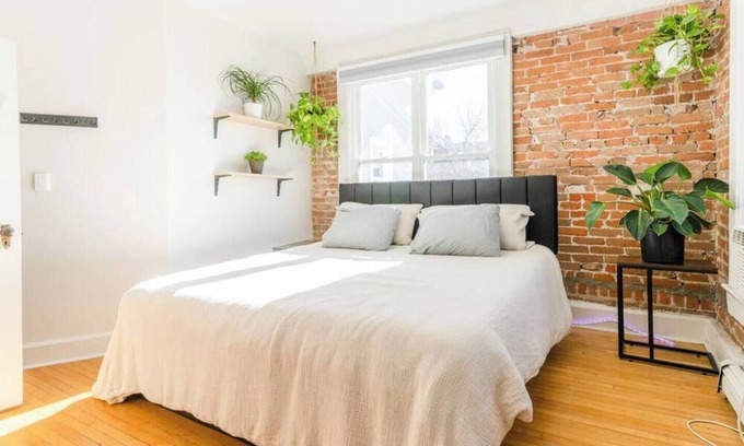 City Park Apartment | Stylish Uptown Retreat - 2BR with Sunroom/Office and Movie Room