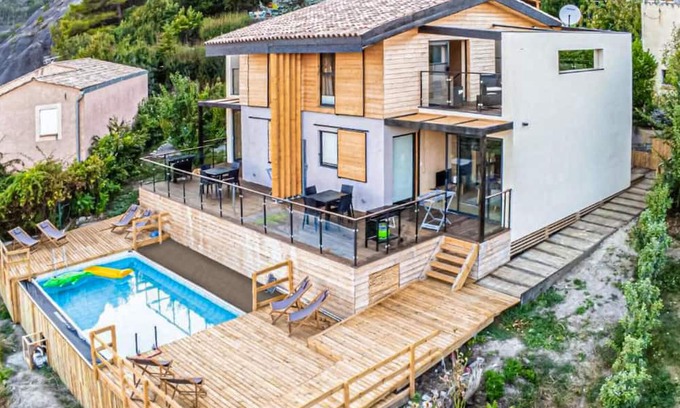 Marcoux Apartment | This beautiful and modern vacation home welcomes you with a breathtaking mountain view.