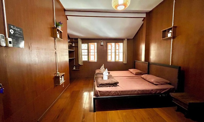 Chang Phueak House | Stay in Style: Cozy AC Room, Tropical Garden & Prime Location.