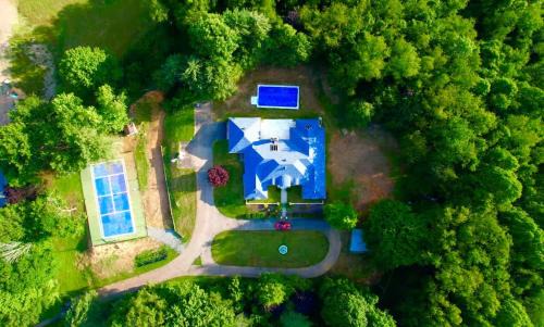 Andover House | Gated Mansion - Basketball Court Movie Theater Views